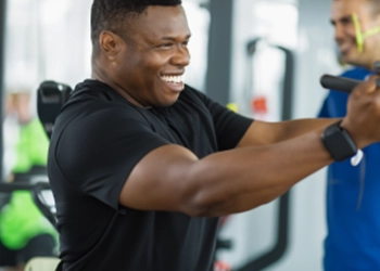 A fit man doing arm workout