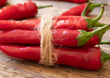 red cayenne peppers in a stack