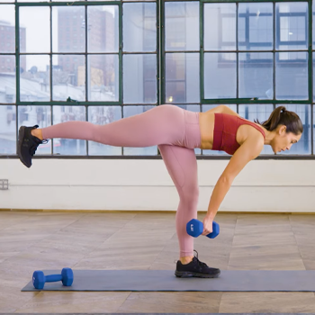 woman in a single leg deadlift position