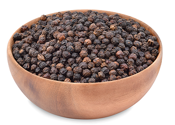 wooden bowl filled with black pepper