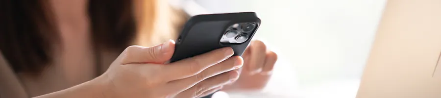 hand view of a woman on her phone