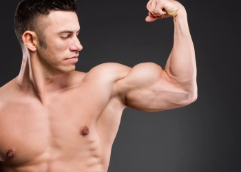 man showing his biceps