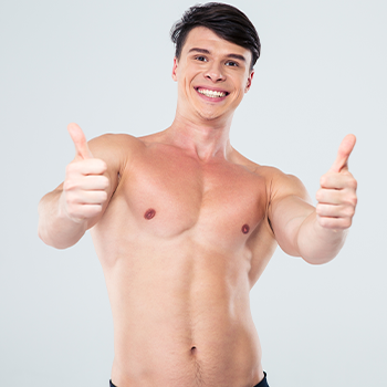 shirtless man giving a thumbs up