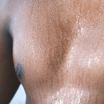 chest view of a man sweating