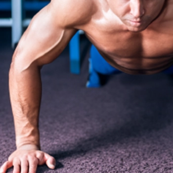 A man working out doing push ups