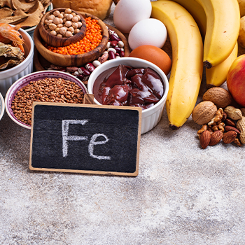 iron food sources with a black board