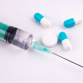 syringe and capsules