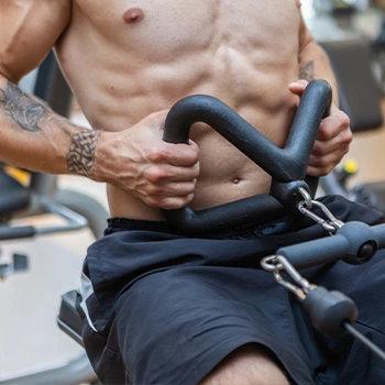 man using a cable row