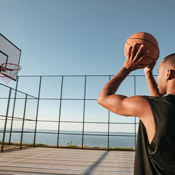 man doing basketball