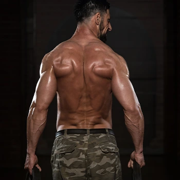 shirtless man working out