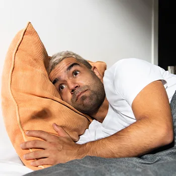 confused man on a pillow