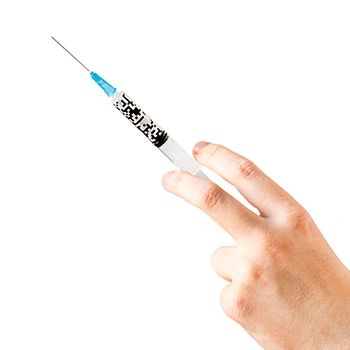 hand holding a syringe