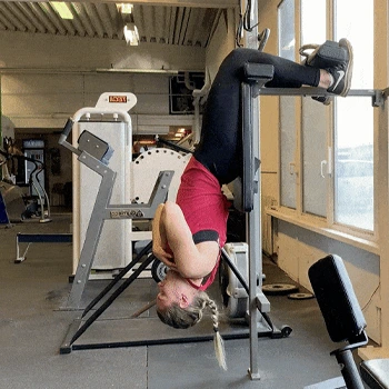 woman in a hanging situp position