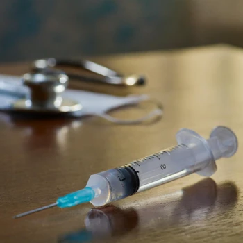 syringe on table