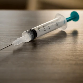 Syringe on the table