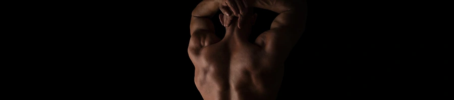 man showing his back muscles