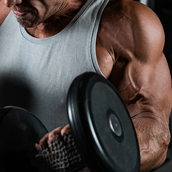 Close up image lifting a dumbbell