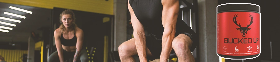 A man lifting up something in the gym