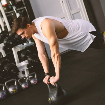 A man exercising on the floor