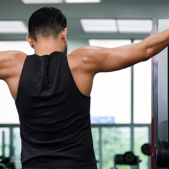 A person working out arms, shoulder, and abs