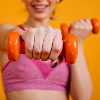 Close up image of lifting dumbbell