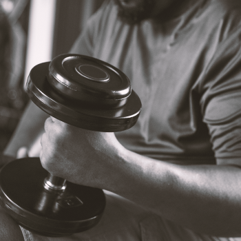 A person lifting a dumbbell