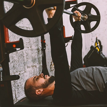 A man doing bench presses