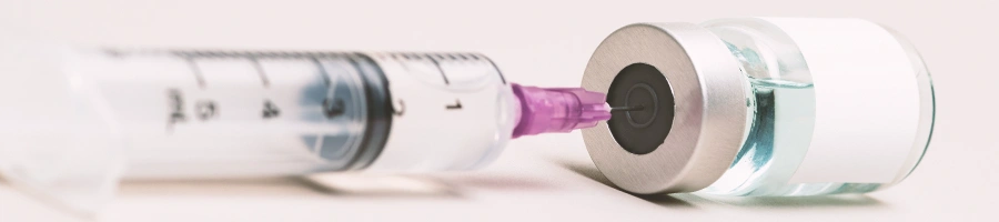 A syringe injected inside a pill