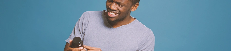 A man looking confused at supplements