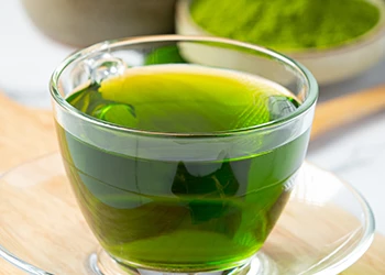 A green tea on a mug glass