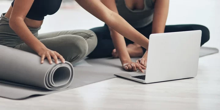 Women watching videos on a laptop