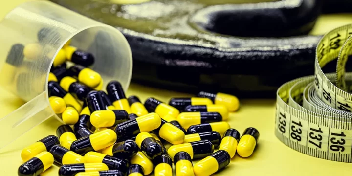 Yellow and black pills spilled