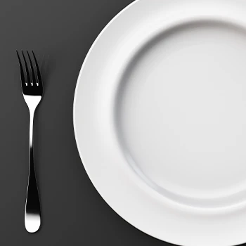 A fork and an empty plate