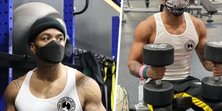 Method Man lifting wearing a beanie and a face mask; lifting dumb bells
