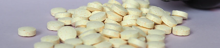 Yellow supplements on table