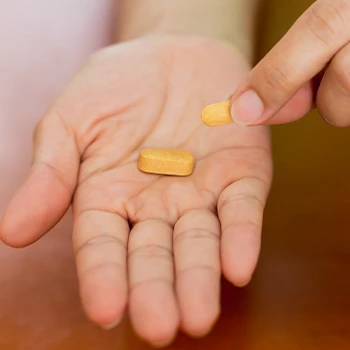 Holding a single pill on hand
