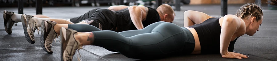 Partners working out in the gym