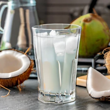 Coconut water inside a bottle glass