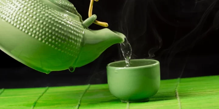 Pouring hot water on a cup