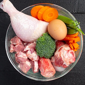 A healthy protein foods and vegetables inside a bowl