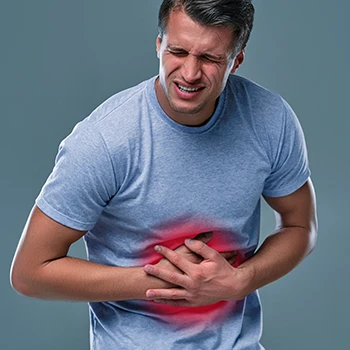 A person with aching stomach with red highlights