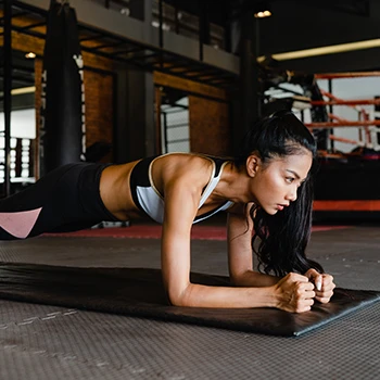 A woman performing a plank