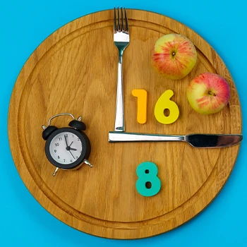A concept of fasting, using fruits and numbers to visualize a clock