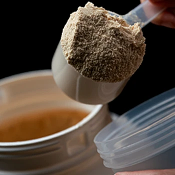 Close up image of a protein powder scoop