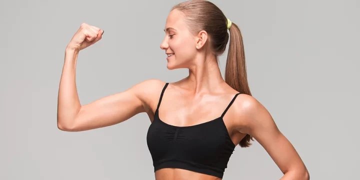 Woman flexing her muscles