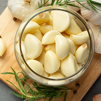 Top view of garlic in a glass jar