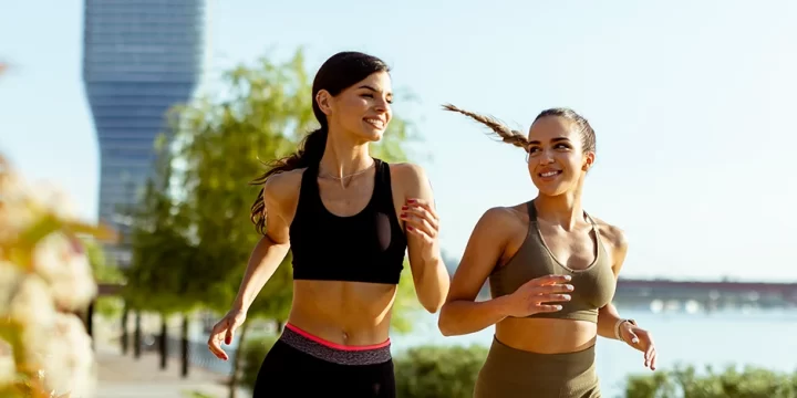 Women doing running exercise outdoors