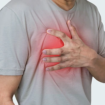 Man holding his chest with red glow