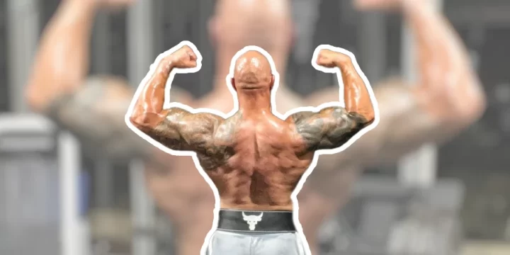 The Rock showing his back muscles