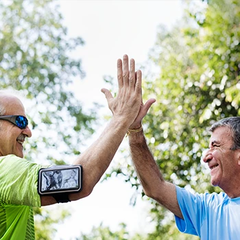 Old people doing high fives